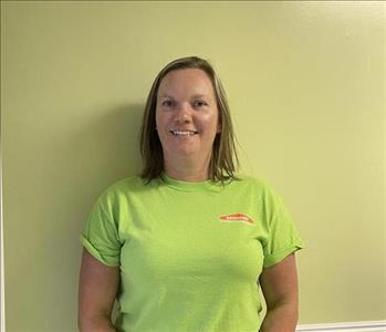 Woman standing with Servpro shirt on