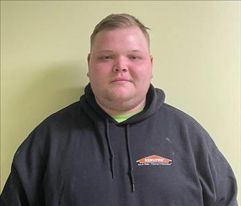 Young man standing with a Servpro sweatshirt on