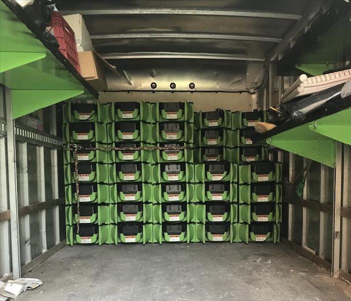 SERVPRO truck getting unloaded at a job.